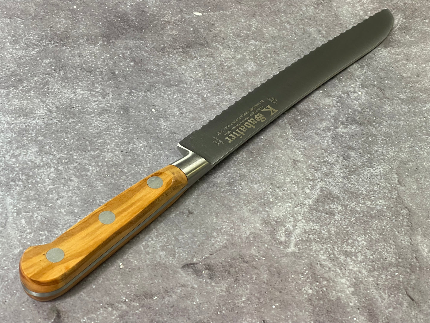 K Sabatier Bread Knife 200mm - HIGH CARBON STEEL - OLIVE WOOD HANDLE